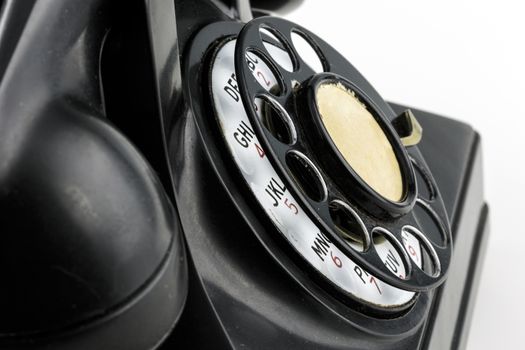 Close angled view of old fashioned rotary phone