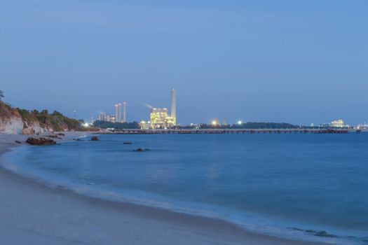 Power plant with bay on night time