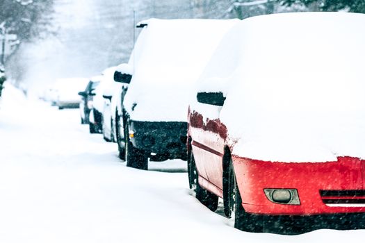 Parked Cars in the Street on a Snowstorm Winter Day