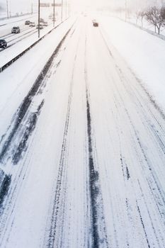 Disturbing Sunset Light and Snowstorm on Highway resulting of a Bad Visibility