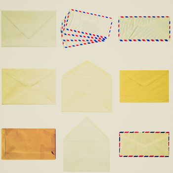 Vintage retro looking Collage of letter or small packet envelope isolated on white