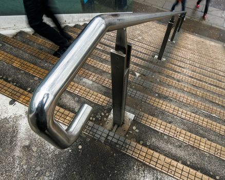 Stairs detail, people going up with motion blur