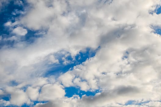 Cloudscape, Colored Clouds at Sunset near the Ocean