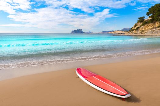 Moraira playa El Portet beach with paddle surfboard at Alicante Spain