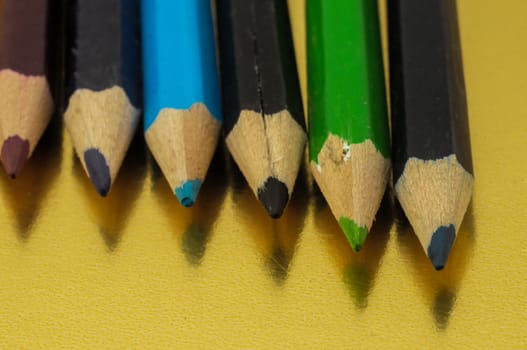 New Pencils Textured Set on a Colored Background