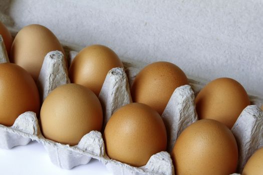 Closeup of eggs in carton