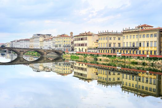Skyline of Florence with reflection in the river, Italy