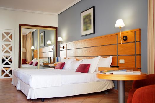 Interior of a hotel room for two, modern and classic style