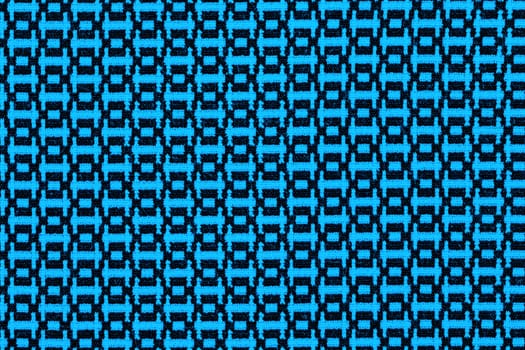Blue material in geometric patterns, a background or texture