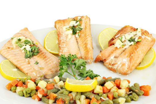 salmon and vegetables on white dish