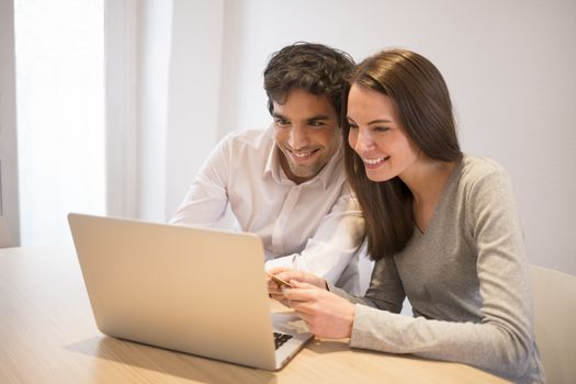 Woman man computer shopping online home