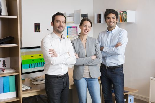 Female male desk colleagues group looking camera