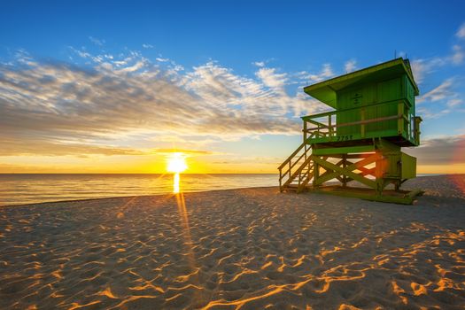 Famous Miami South Beach sunrise with lifeguard tower