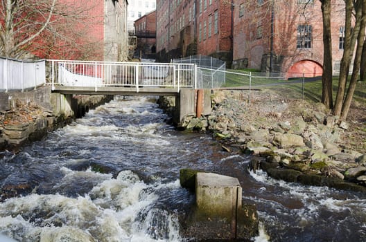 rushing water rushing down from a factory