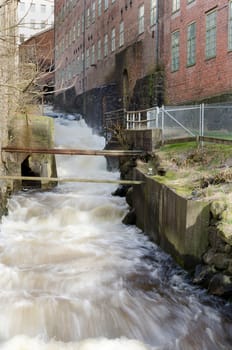 rushing water rushing down from a factory