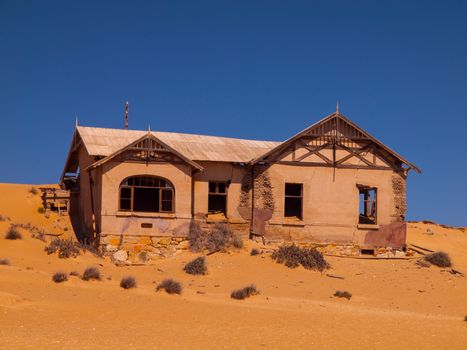 Abandoned house in Kolmanskop ghost village (Namibia)