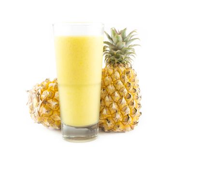 pineapple smoothie with fresh pineapple on white background