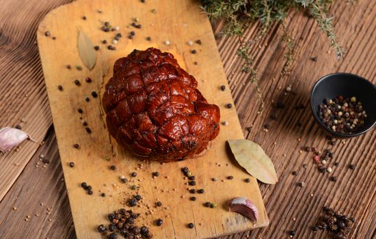 Homemade ham on wooden background