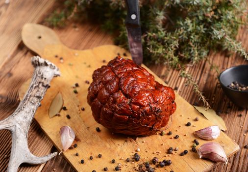 Homemade ham on wooden background