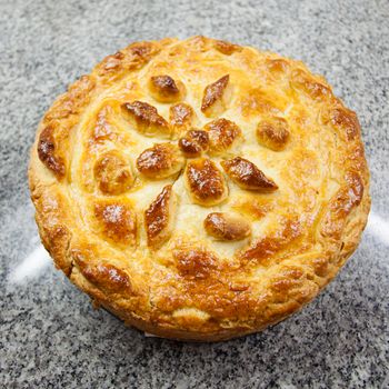 meat pie with beautiful patterns