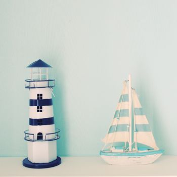 Lighthouse and ship model for decorated in room with retro filter effect