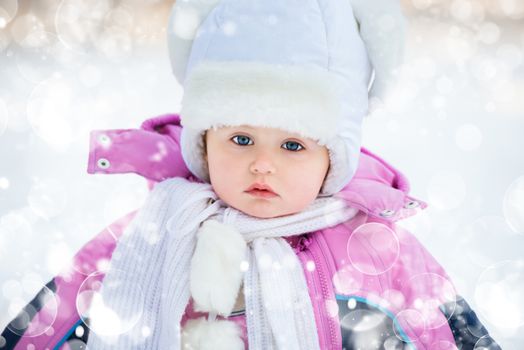 face of a beautiful young girl in winter hat