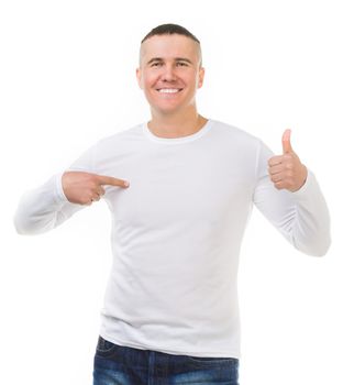 young man in a white shirt with long sleeves with thumbs up isolated on white background