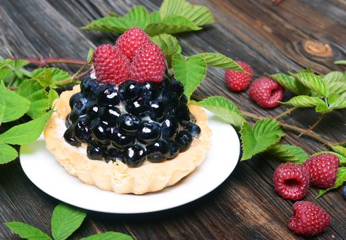 Tasty cupcake with forest fruits