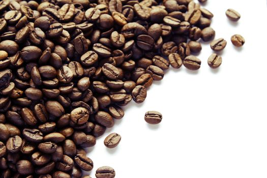 Closeup of coffee beans on plain background 