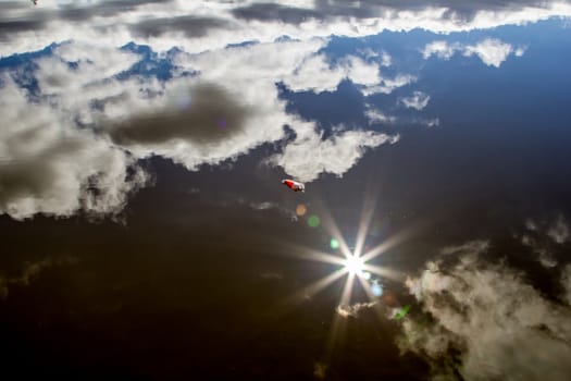 water landscape reflexin the sky and fishing bobber