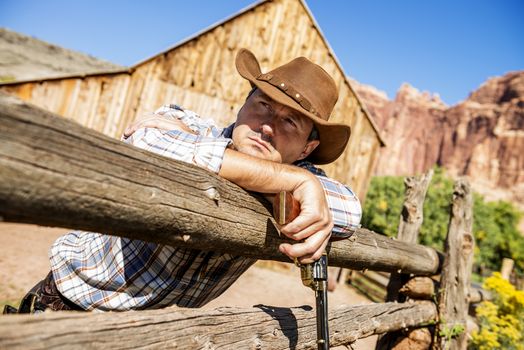 SOUTH WEST - A cowboy takes time to rest and reflect. 