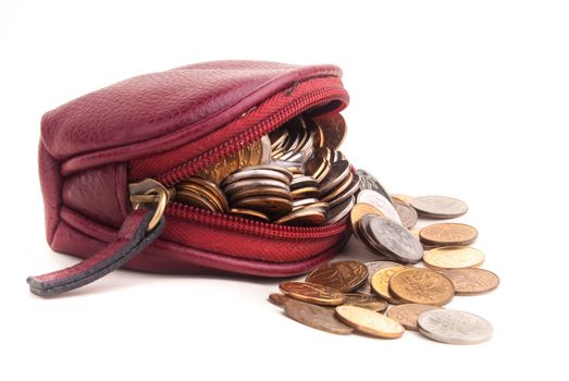 opened vintage purse with coins fallen out of it, isolated on white