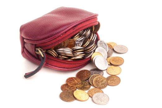opened vintage purse with coins fallen out of it, isolated on white