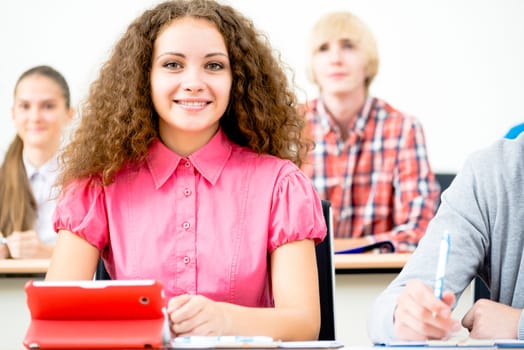 portrait of young female student in the classroom, teaching at the University of