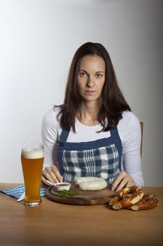 woman with bavarian sausages