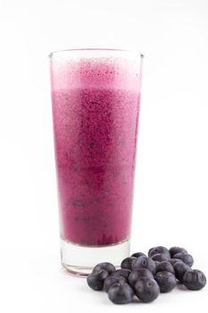 Blueberry smoothie with fresh blueberry on white background 