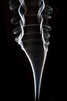 textured of incense smoke on dark background