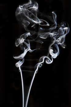 textured of incense smoke on dark background