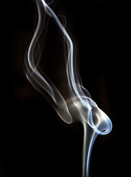 textured of incense smoke on dark background