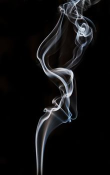 textured of incense smoke on dark background