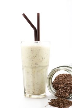 Healthy smooties drink with flaxseed on white background