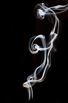 textured of incense smoke on dark background