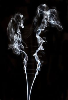 textured of incense smoke on dark background