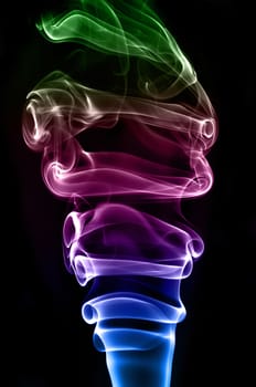 textured of colorful incense smoke on dark background