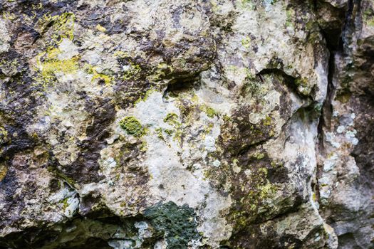 A natural wall of rough stone