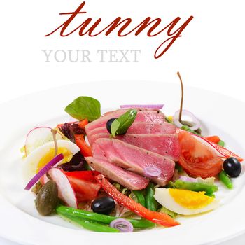 Nicoise with fresh tuna and vegetables isolated