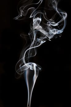 textured of incense smoke on dark background