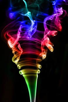 textured of colorful incense smoke on dark background