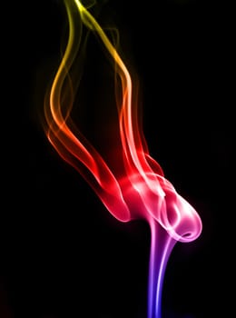 textured of colorful incense smoke on dark background