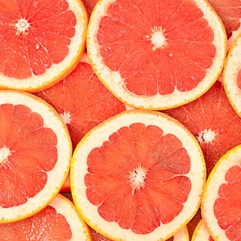 The fresh grapefruit as a background closeup